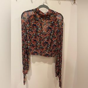 Free People floral blouse. Size medium.